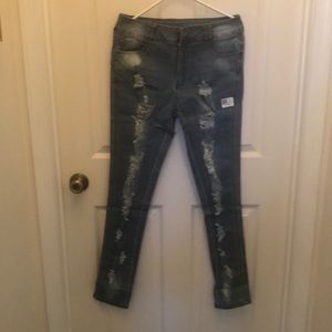 Woman’s distressed jeans -new